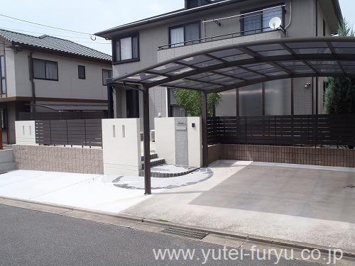 車庫拡張と同時に一新された外構全景。機能性とジャパンディな美しさを両立。